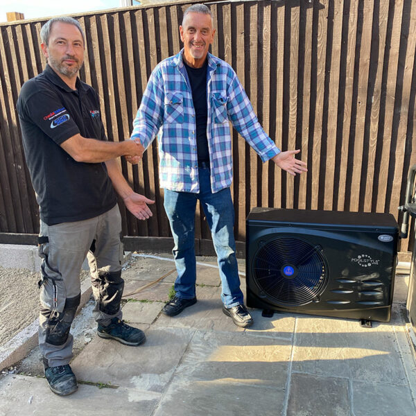 Happy UK Hot Tubs customer with his Air Source Heat Pump installation